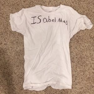 A plain white shirt with a name on it